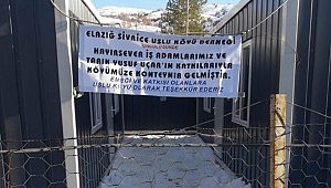 KÖYLÜLERDEN HAYIRSEVERLERE TEŞEKKÜR PANKARTI