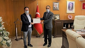 Siperlik ve maske üretenlere plaket