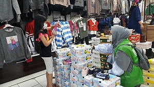 400 yetim çocuk giydirildi